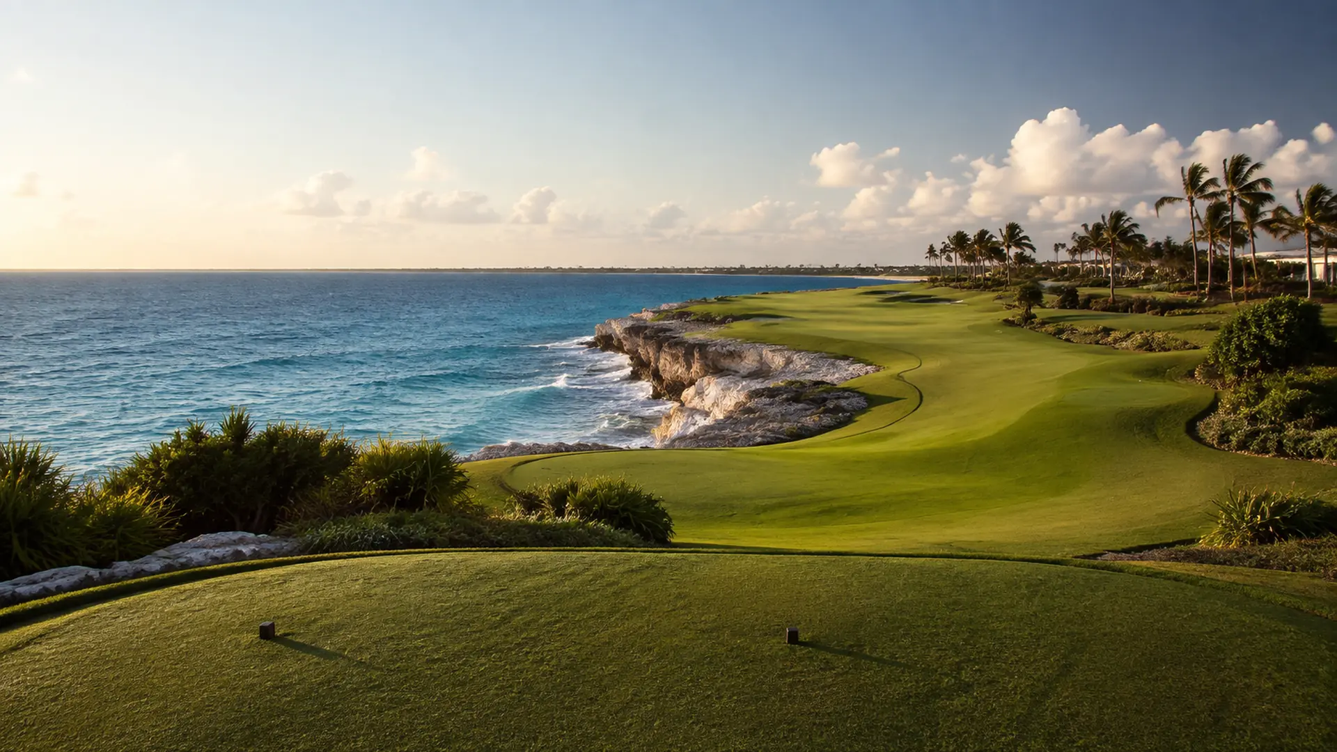 An oceanfront golf fairway running along the cliffs in Cap Cana