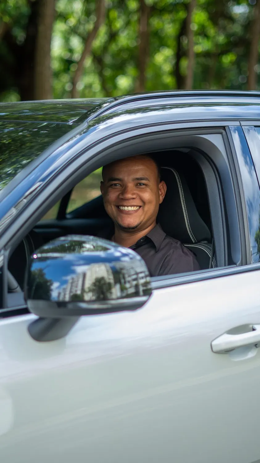 A Transekur chauffeur at the wheel of a company vehicle